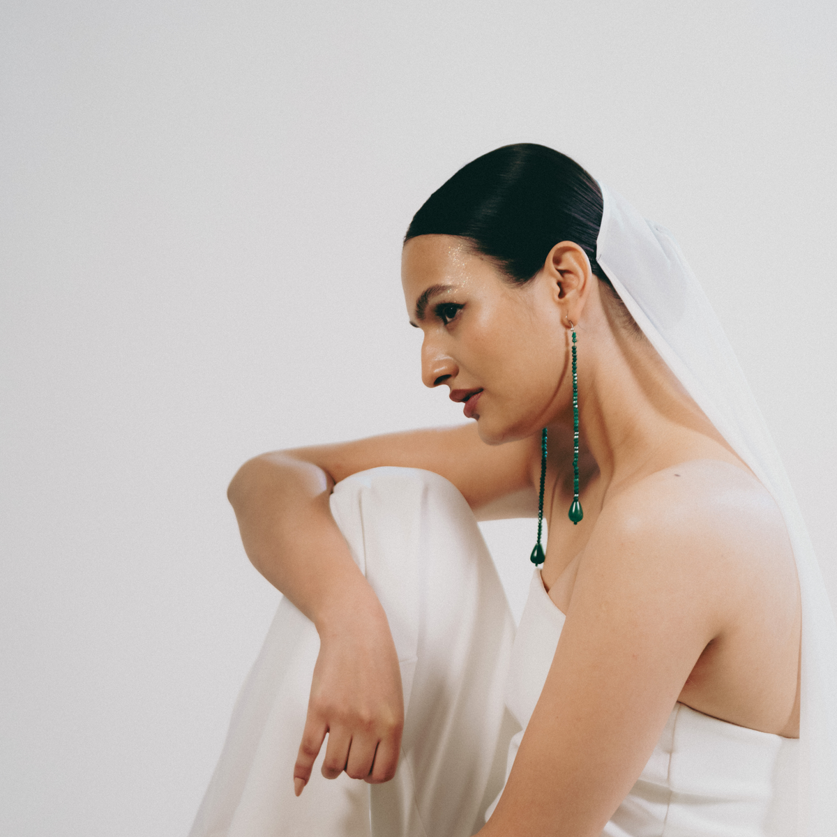 Streamline handcrafted earrings in emerald green onyx teardrop beads