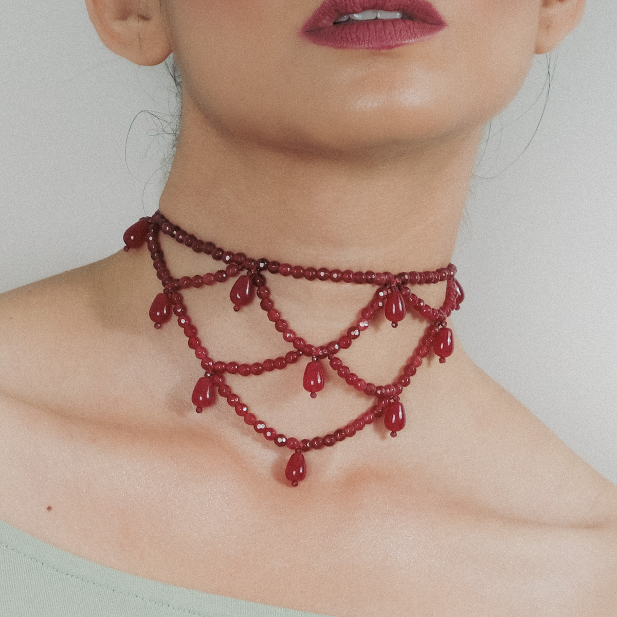 CrimsonWeave handcrafted maroon natural stone choker with Suti and Zari Patwa work